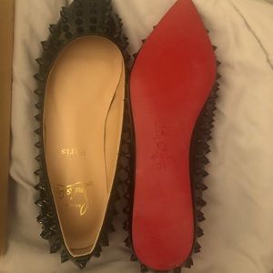 Turn heads stepping out in your new Christian Louboutin Pigalle black flats.